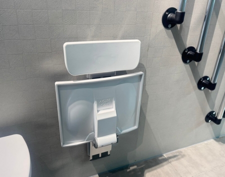 Adjustable shower seat with backrest